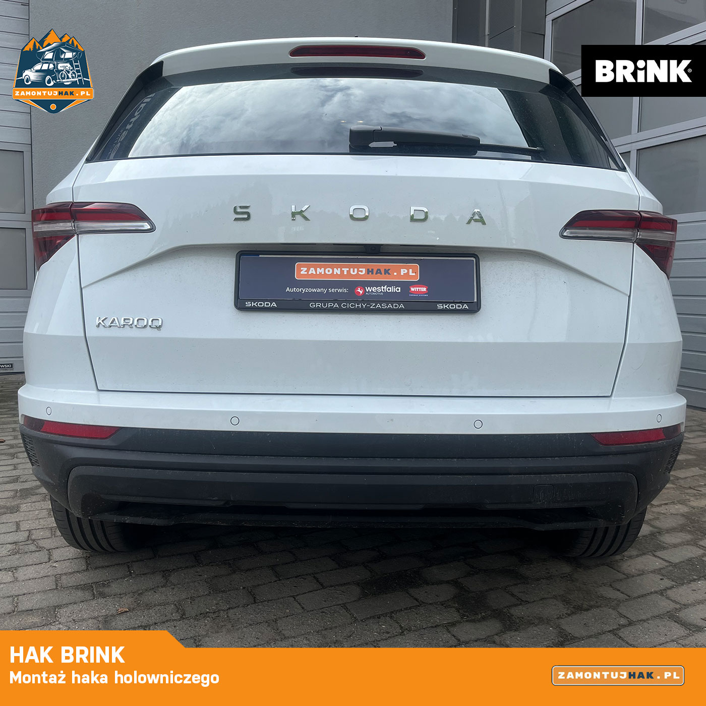 Zbliżenie na hak Brink zamontowany pod zderzakiem Skoda Karoq